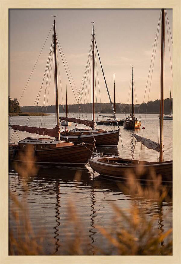 Sailboats Anchored In Tranquil Waters