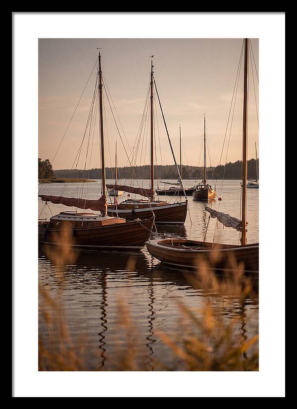 Sailboats Anchored In Tranquil Waters