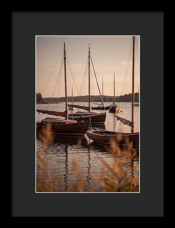 Sailboats Anchored In Tranquil Waters