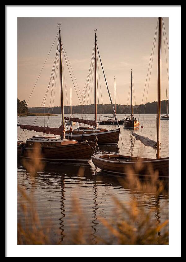 Sailboats Anchored In Tranquil Waters