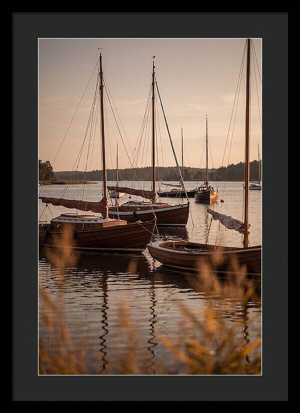 Sailboats Anchored In Tranquil Waters