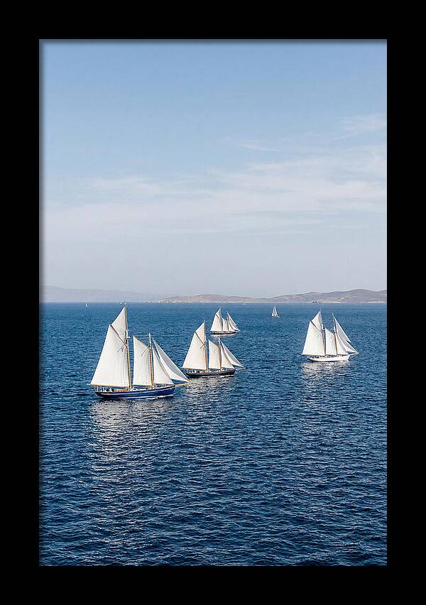 Sailboats Racing Across Blue Waters