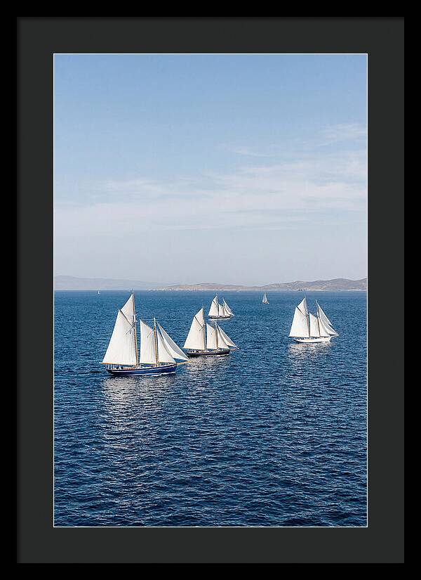 Sailboats Racing Across Blue Waters