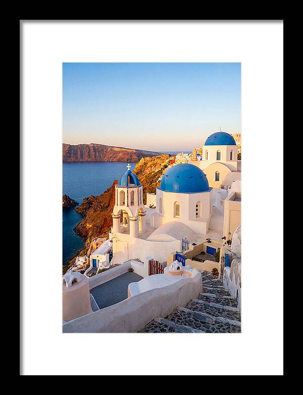Santorinis Sunset Over Blue Domes