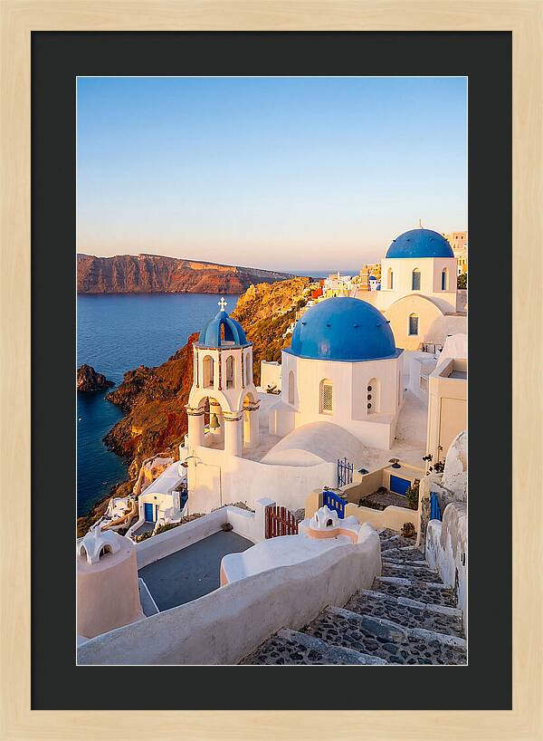 Santorinis Sunset Over Blue Domes