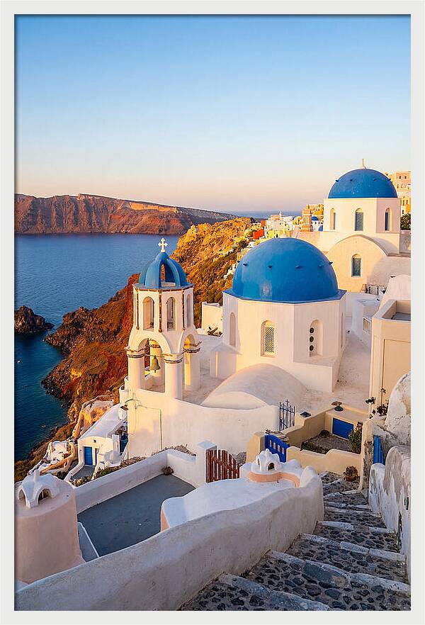 Santorinis Sunset Over Blue Domes