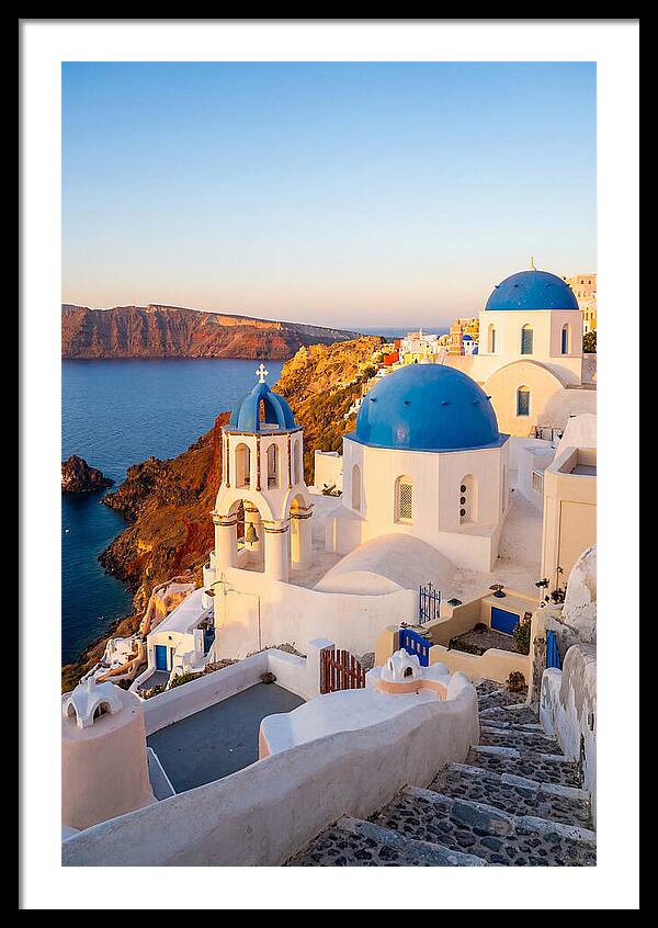 Santorinis Sunset Over Blue Domes