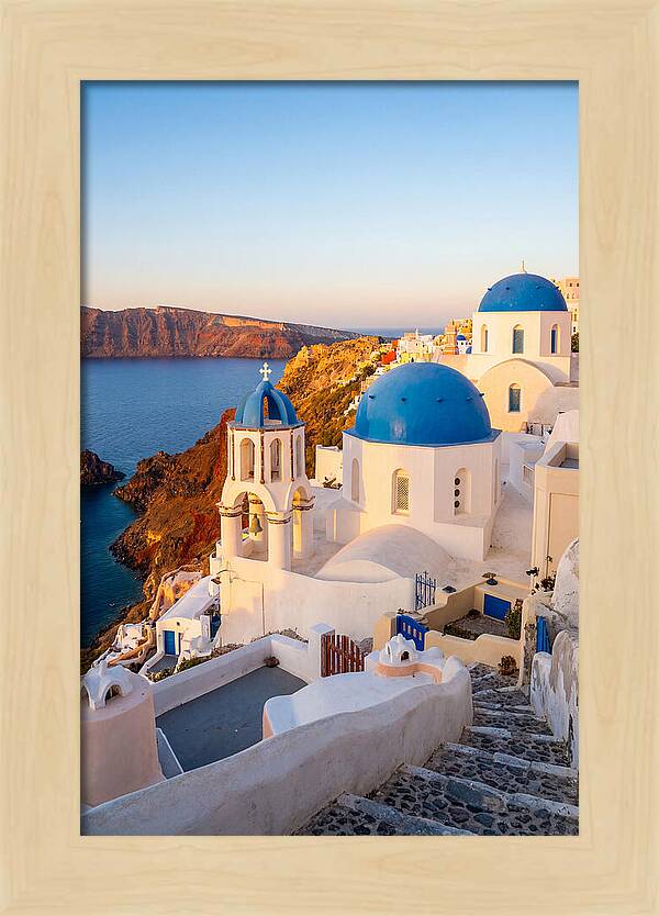 Santorinis Sunset Over Blue Domes