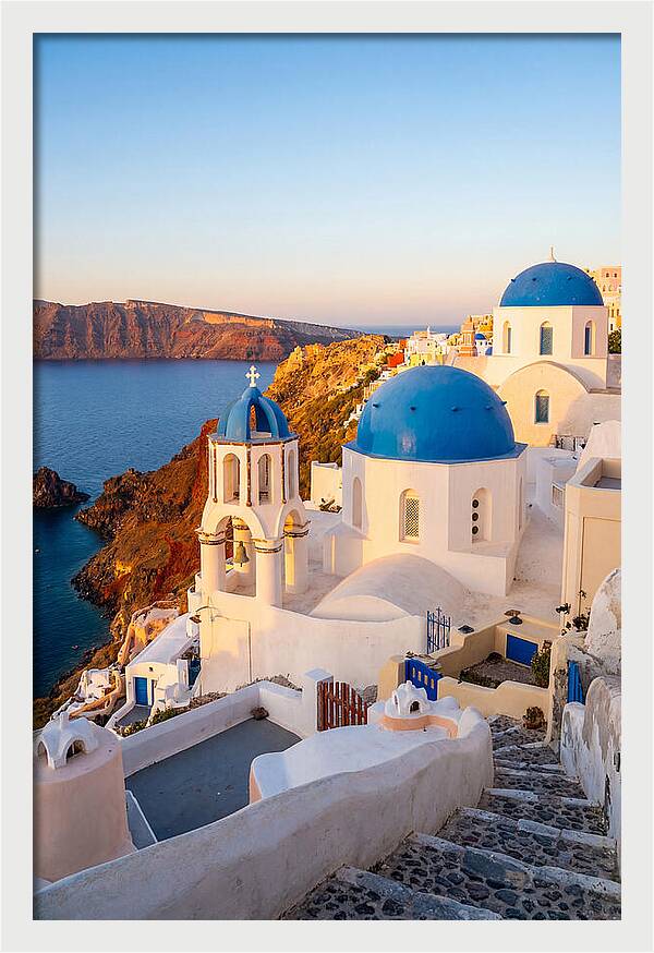 Santorinis Sunset Over Blue Domes