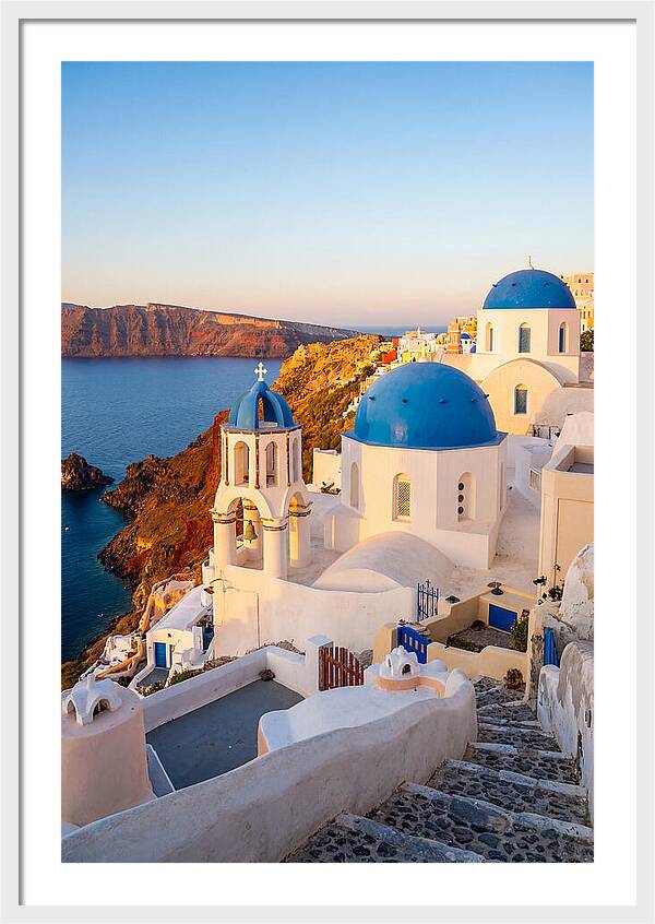 Santorinis Sunset Over Blue Domes