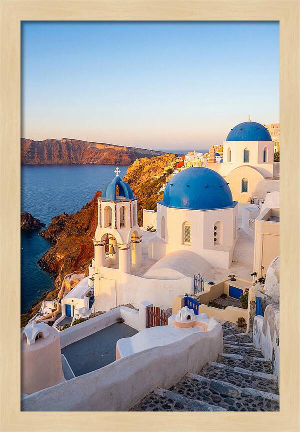 Santorinis Sunset Over Blue Domes
