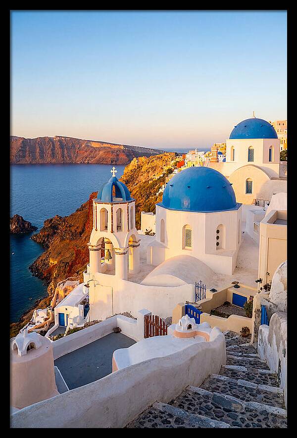 Santorinis Sunset Over Blue Domes