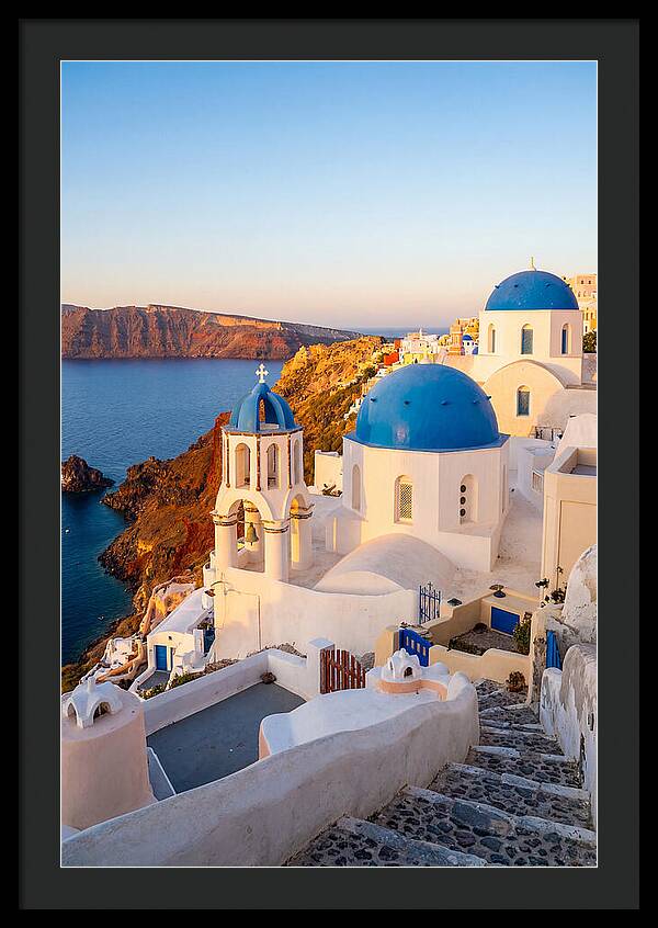 Santorinis Sunset Over Blue Domes