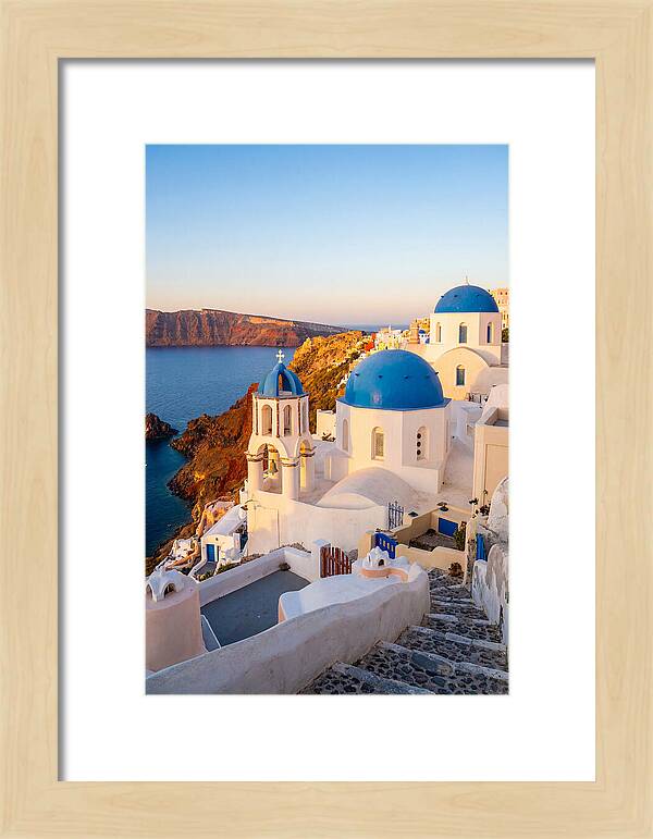 Santorinis Sunset Over Blue Domes