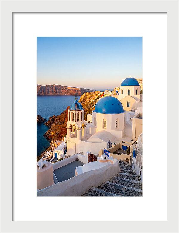 Santorinis Sunset Over Blue Domes