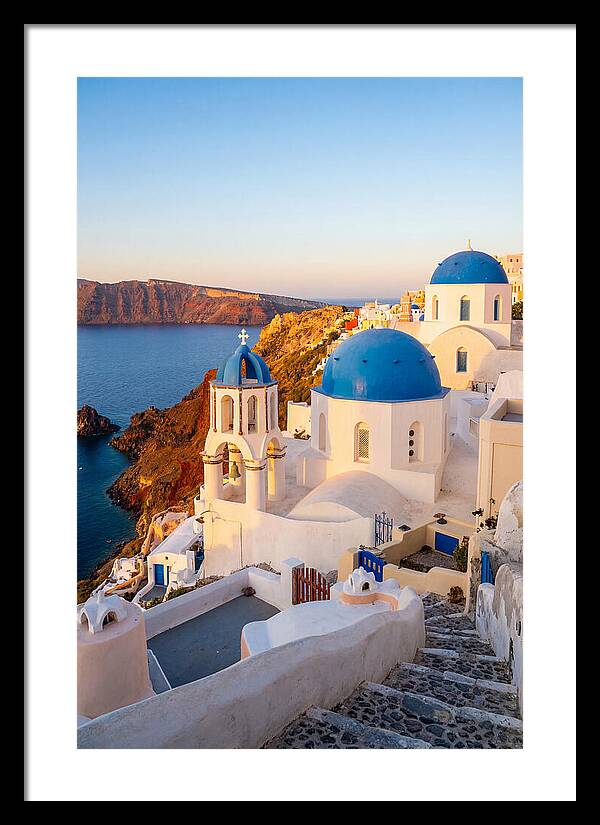 Santorinis Sunset Over Blue Domes