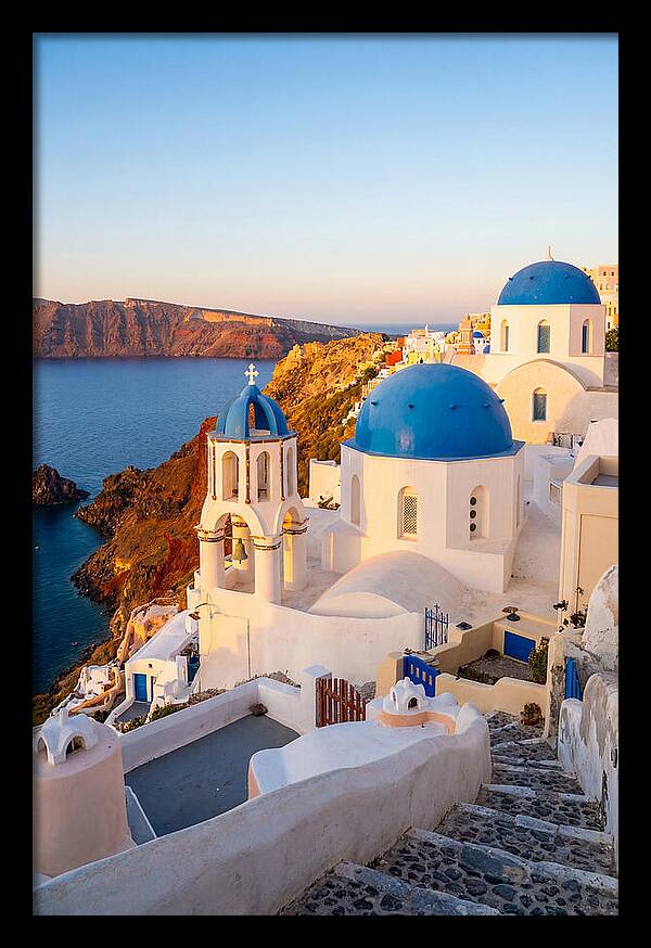 Santorinis Sunset Over Blue Domes