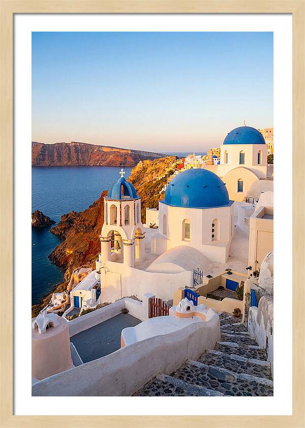 Santorinis Sunset Over Blue Domes