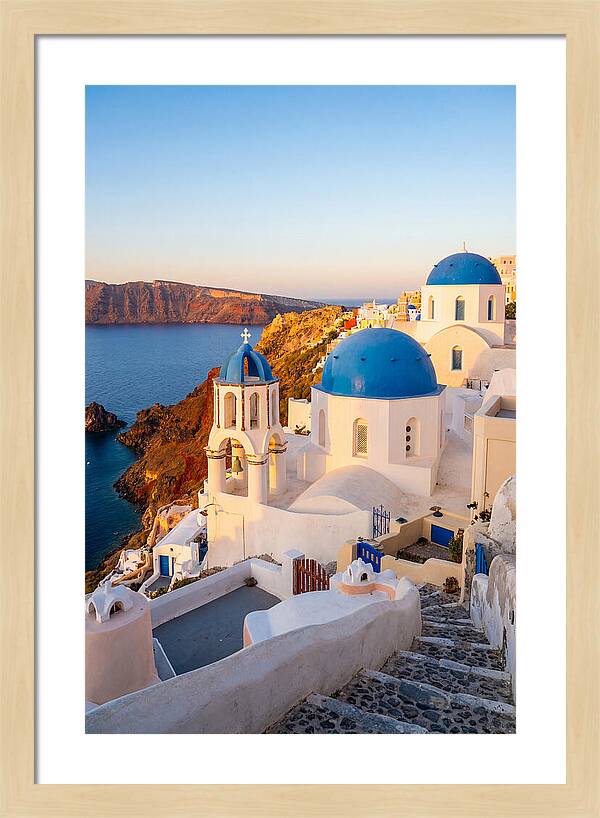 Santorinis Sunset Over Blue Domes