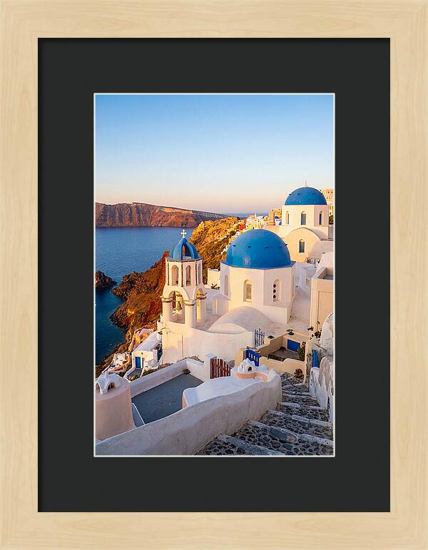 Santorinis Sunset Over Blue Domes