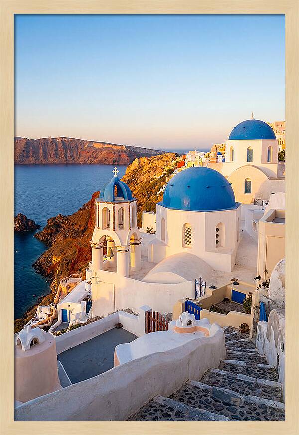 Santorinis Sunset Over Blue Domes