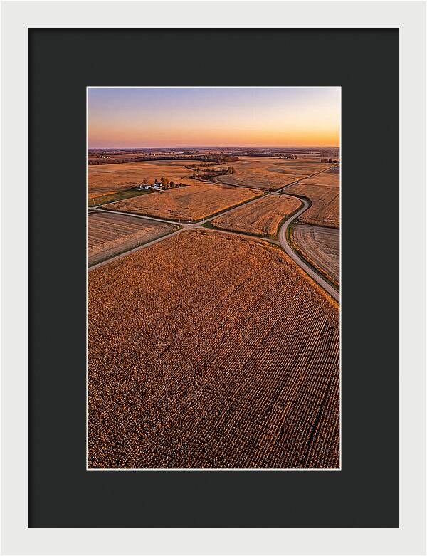 Seasonal Sunset Over Cornfields
