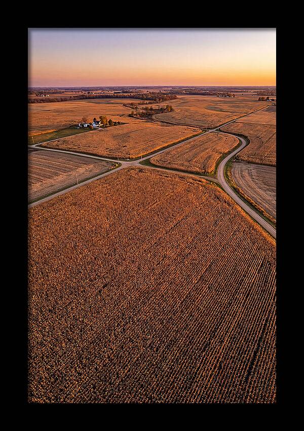 Seasonal Sunset Over Cornfields