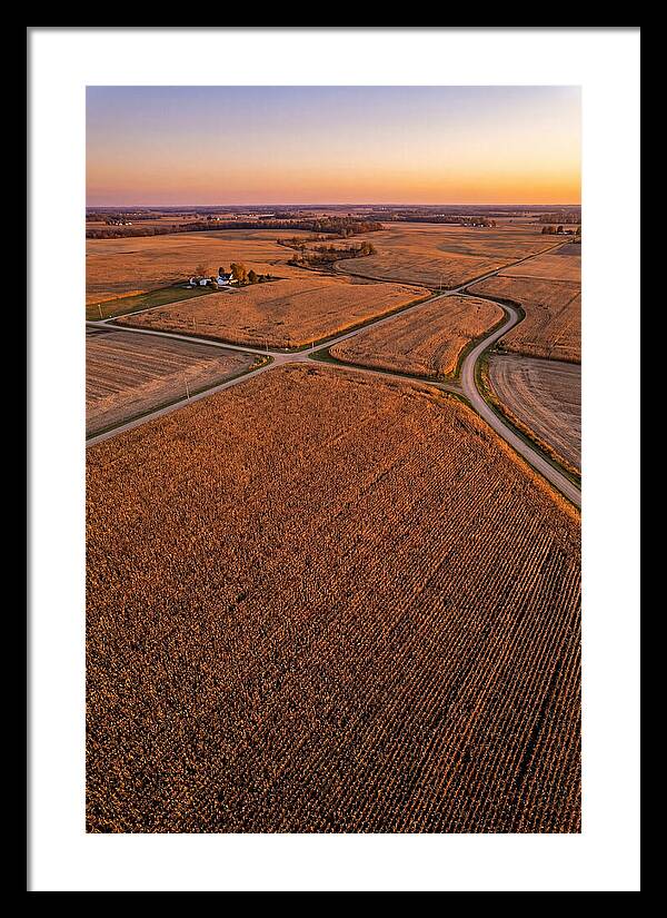 Seasonal Sunset Over Cornfields