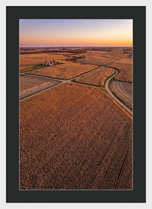 Seasonal Sunset Over Cornfields