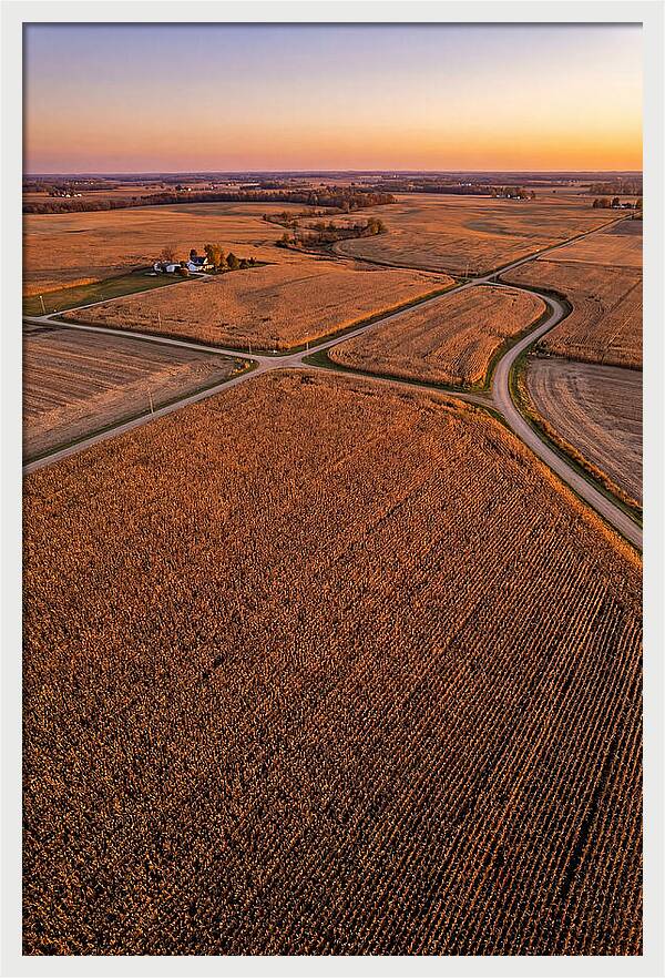 Seasonal Sunset Over Cornfields