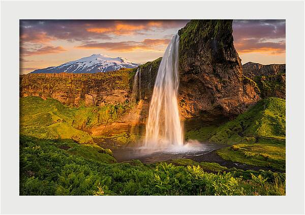 Seljalandsfoss Waterfall At Midnight Sun