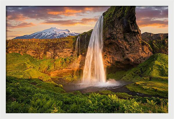 Seljalandsfoss Waterfall At Midnight Sun
