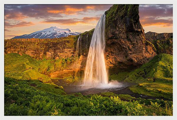 Seljalandsfoss Waterfall At Midnight Sun