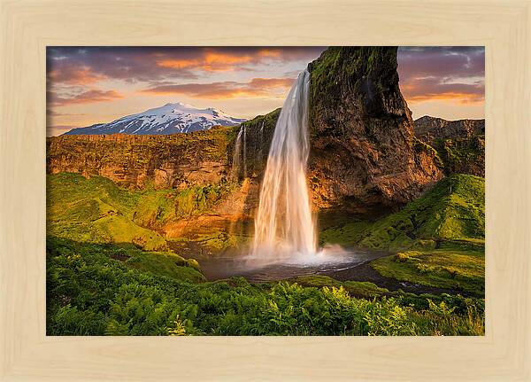 Seljalandsfoss Waterfall At Midnight Sun