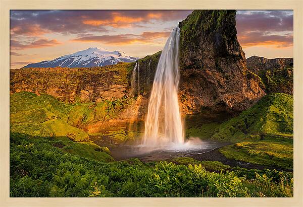 Seljalandsfoss Waterfall At Midnight Sun