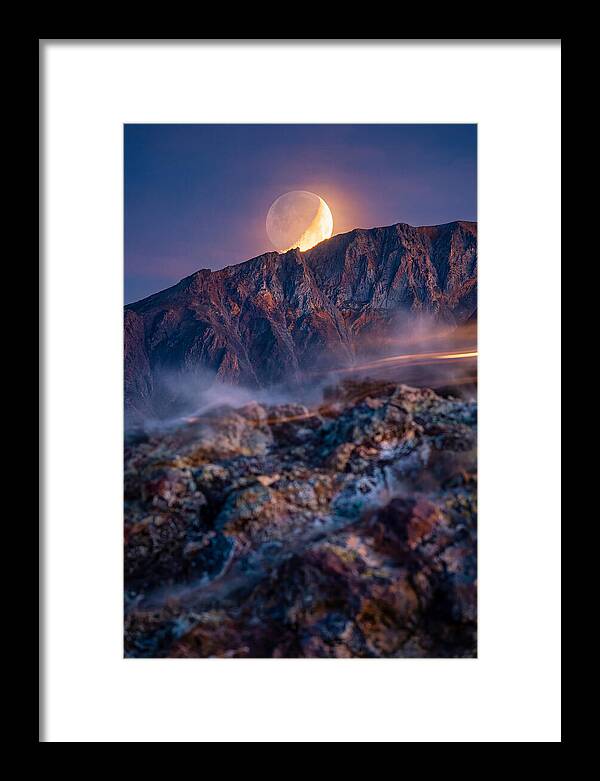Serene Moonlight Above Towering Mountains