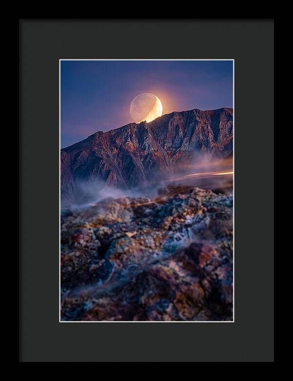 Serene Moonlight Above Towering Mountains