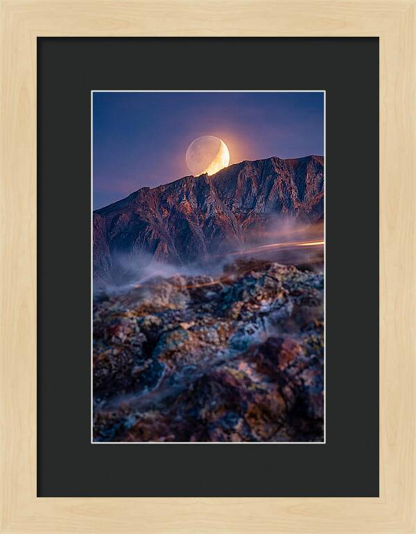 Serene Moonlight Above Towering Mountains