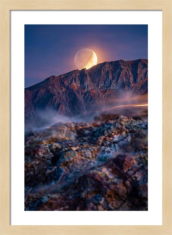 Serene Moonlight Above Towering Mountains