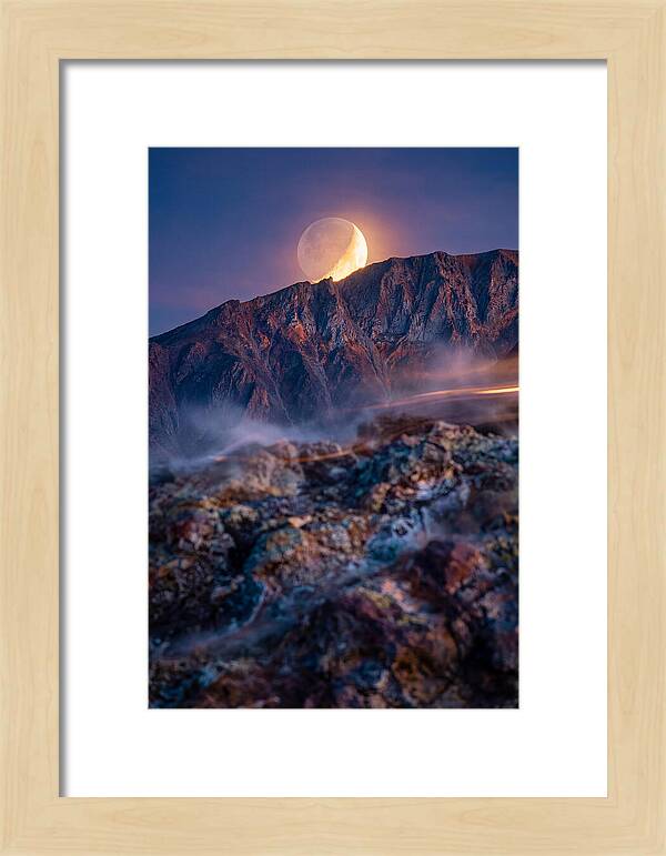 Serene Moonlight Above Towering Mountains