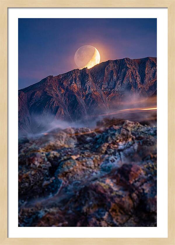 Serene Moonlight Above Towering Mountains