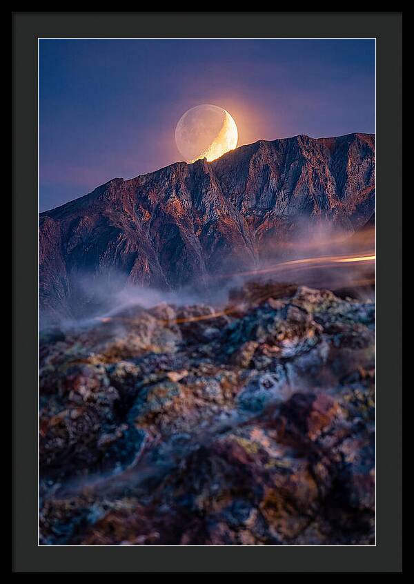 Serene Moonlight Above Towering Mountains