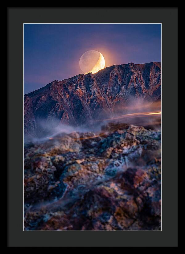 Serene Moonlight Above Towering Mountains