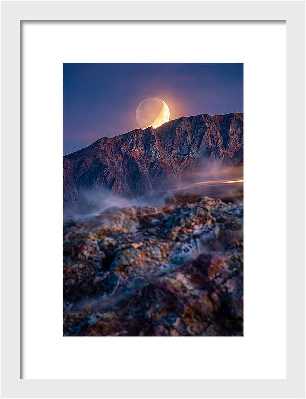 Serene Moonlight Above Towering Mountains