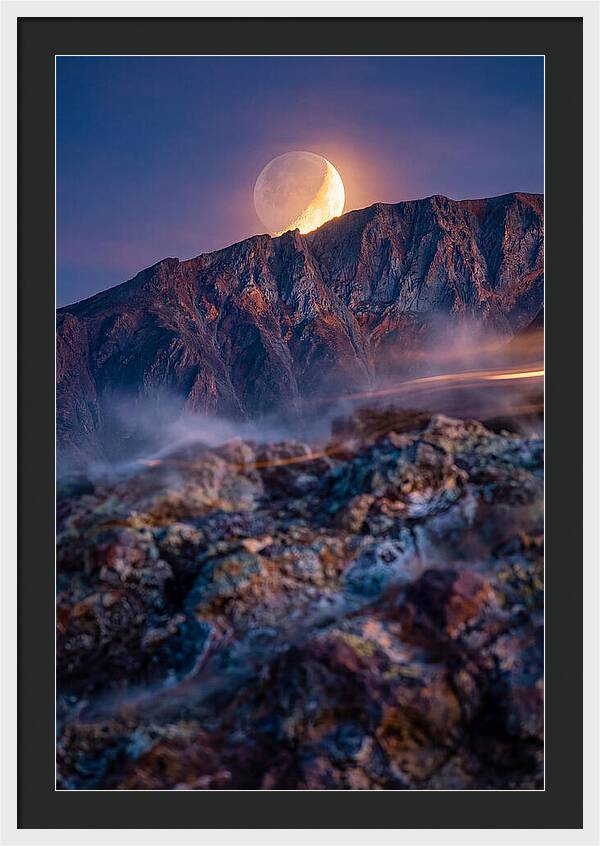 Serene Moonlight Above Towering Mountains
