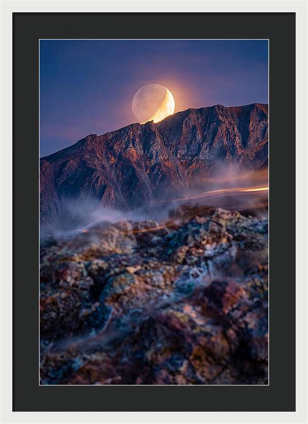 Serene Moonlight Above Towering Mountains