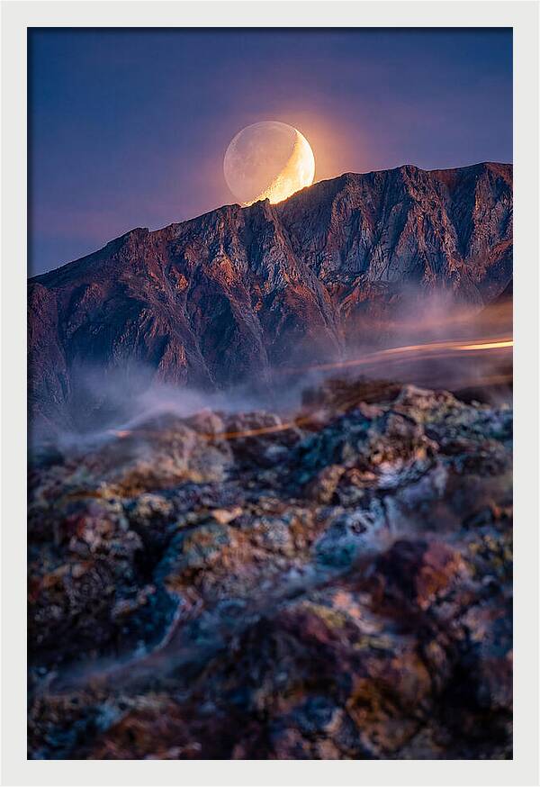Serene Moonlight Above Towering Mountains