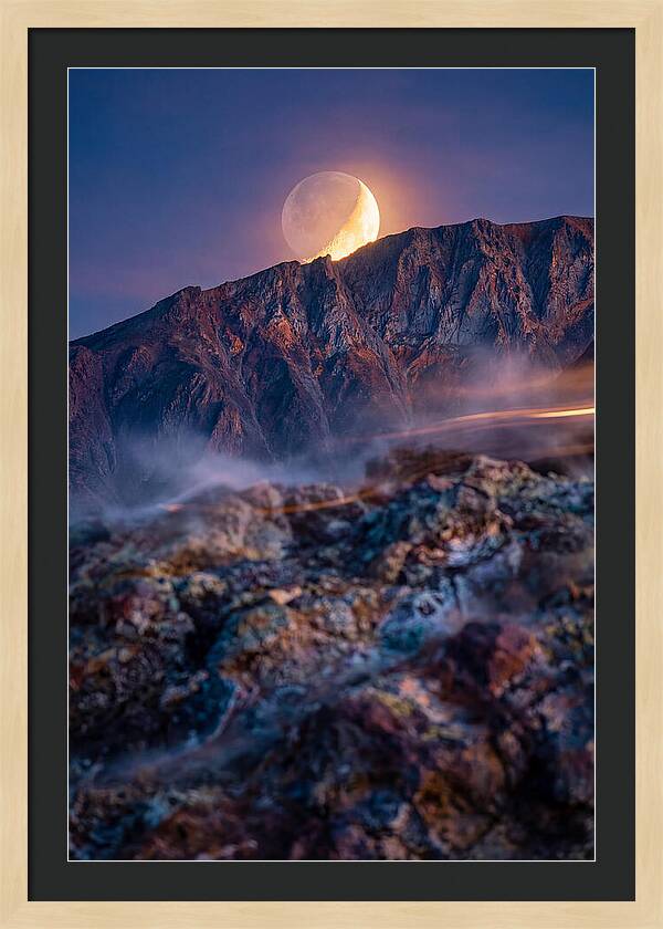 Serene Moonlight Above Towering Mountains