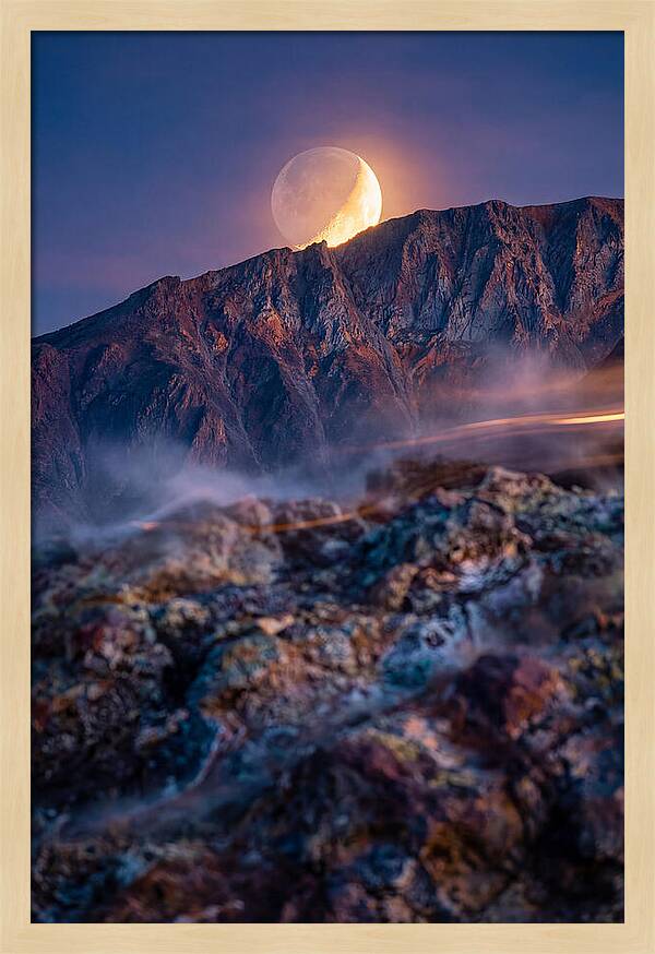 Serene Moonlight Above Towering Mountains