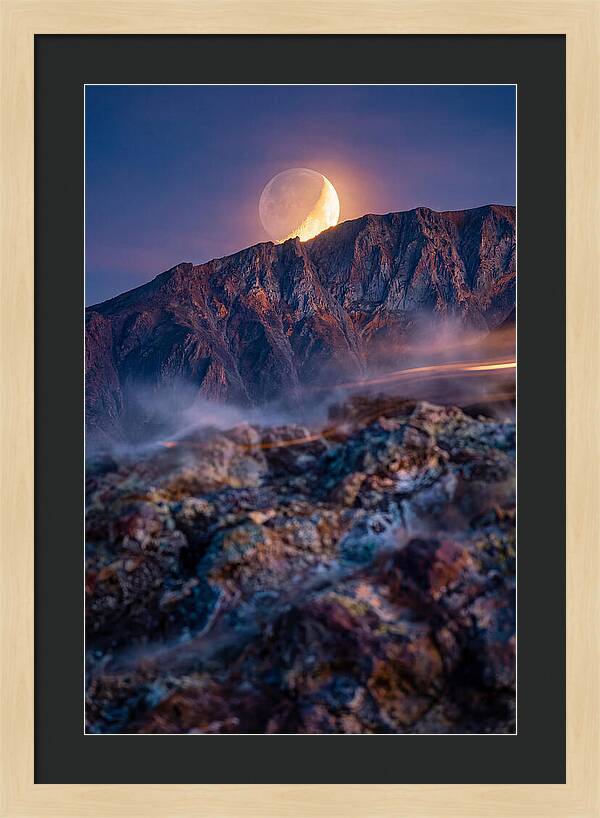 Serene Moonlight Above Towering Mountains